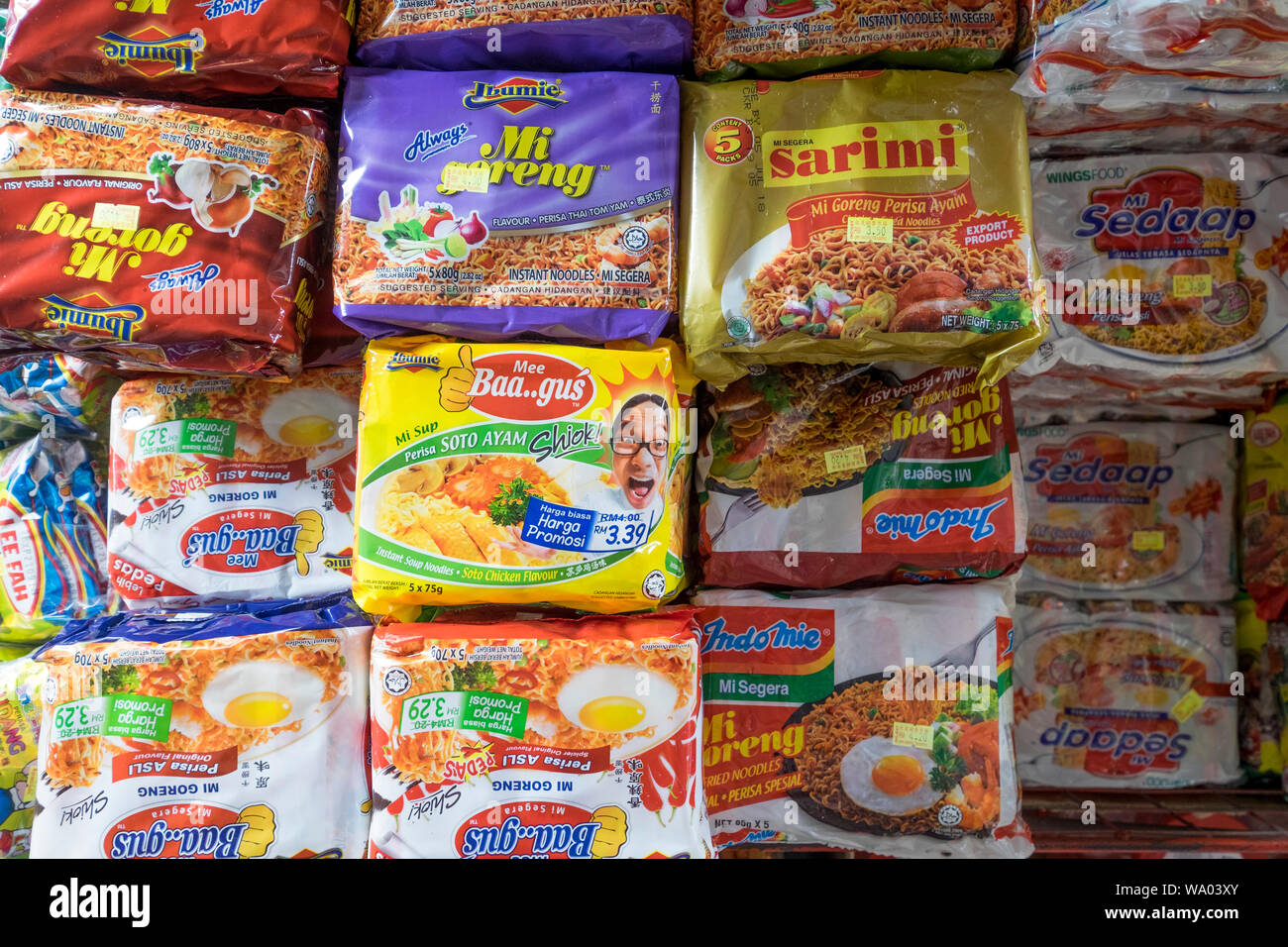 A wide selection of local soups and noodle dish packets are for sale in a market in Kuching, Malaysia. Stock Photo