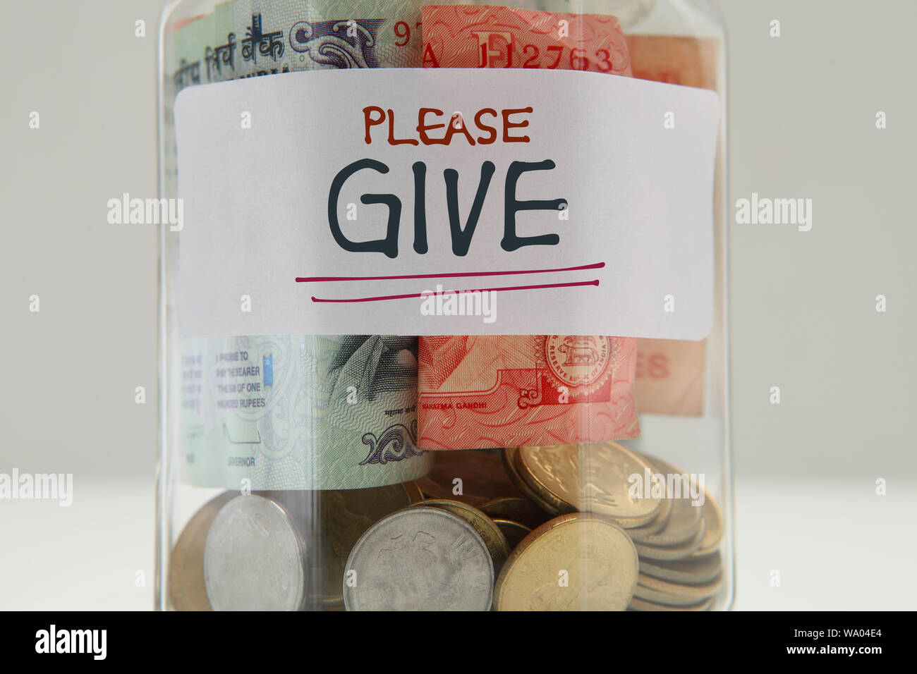 Donation glass jar Stock Photo Alamy