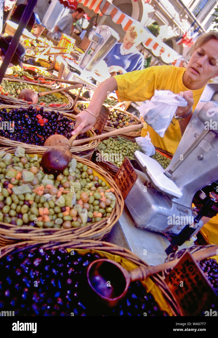 Olives are small fruits that are cured and fermented for food that is healthy and flavourful. Olive oil is extracted from olives. Stock Photo