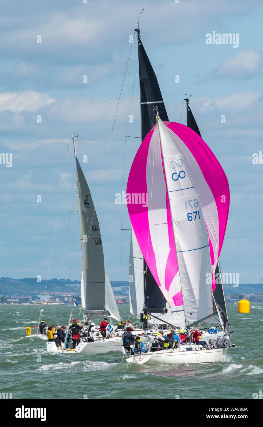 yachts racing off of cowes on the isle of wight during the annual cowes