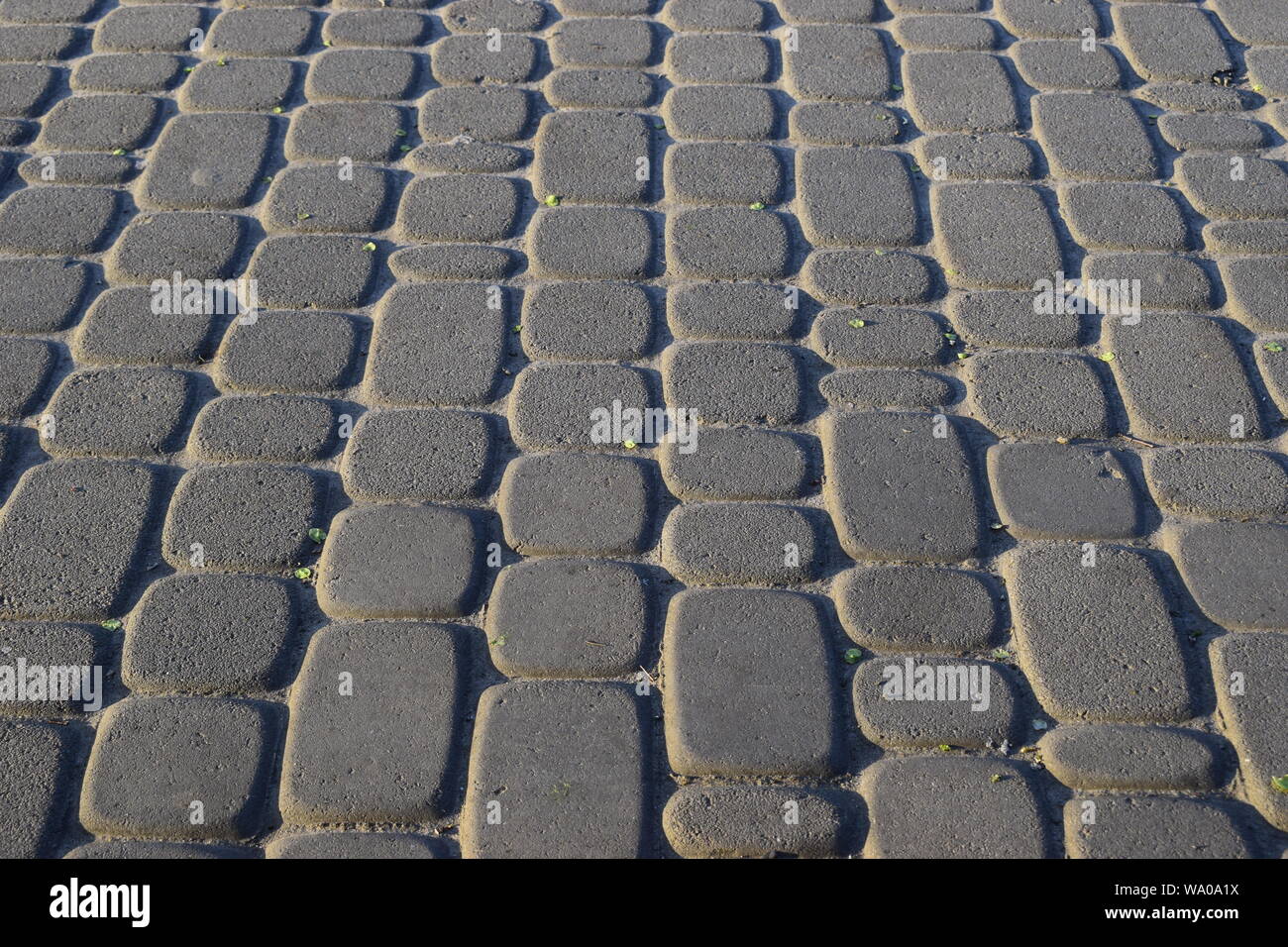 Abstract background - gray paving slabs close-up. Stock Photo