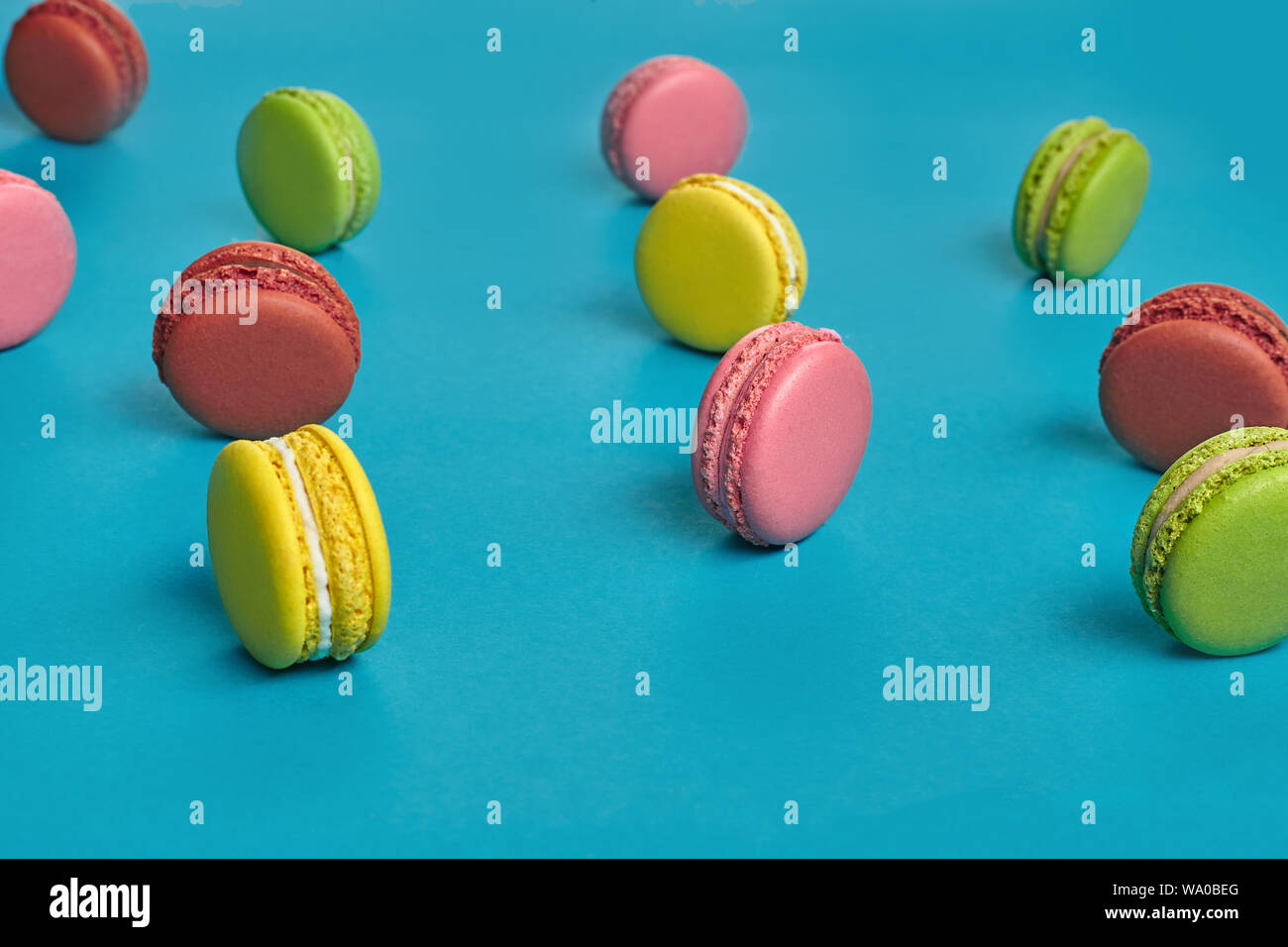 Side view of a multicolored macarons or macaroons, sweet meringuebased