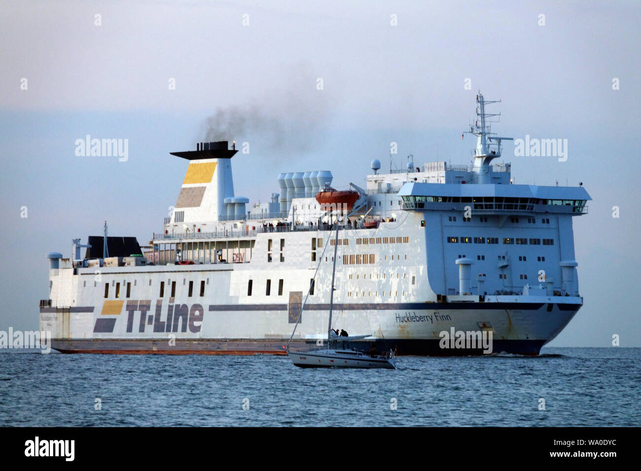 TT-Line ferry boat Huckleberry Finn sailing by Baltic sea, leaving Rostock Germany Ostsee Stock Photo