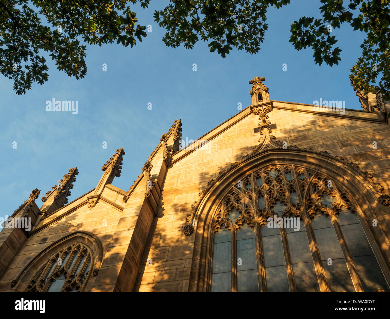 Sunset light illuminating Leeds Minster Kirkgate Leeds West Yorkshire England Stock Photo
