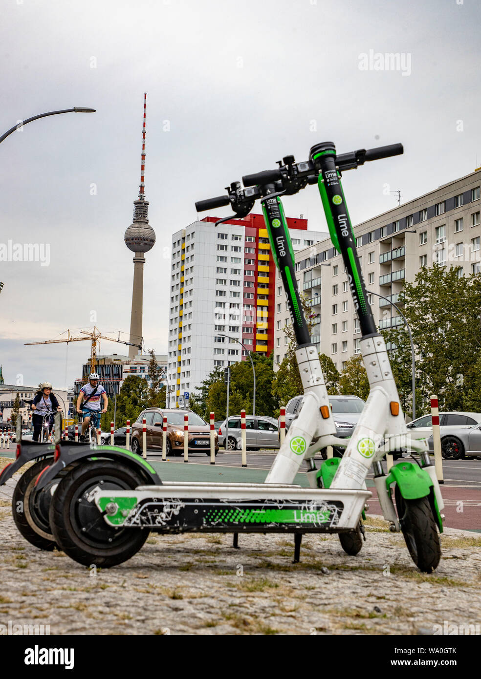 E-scooter, electric scooter, rental scooter, in Berlin, parking at the roadside, sidewalk, MŸhlenstrasse, Friedrichshain, Stock Photo