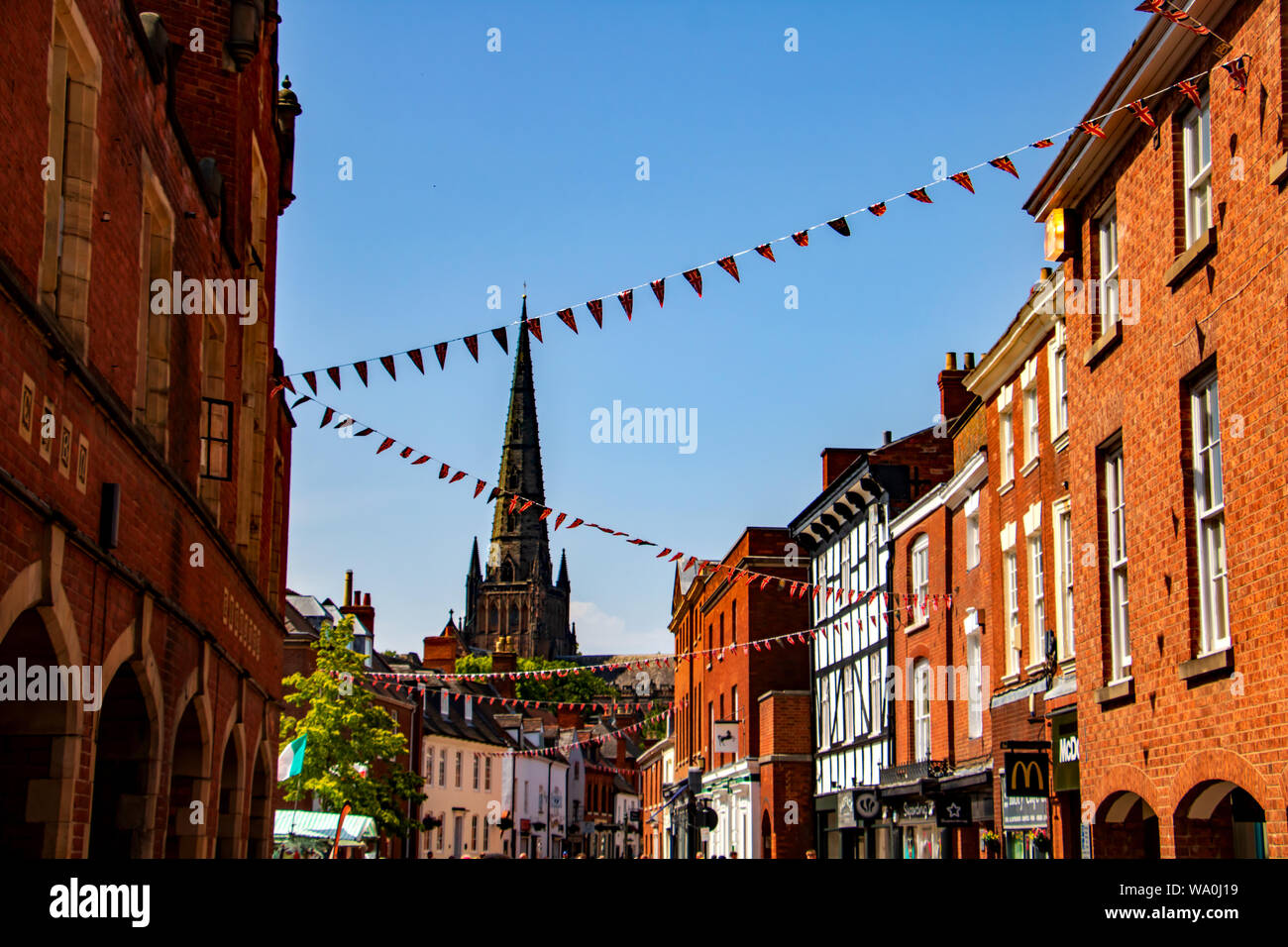 A view down Conduit Street past shops towards Lichfield Cathedral Stock