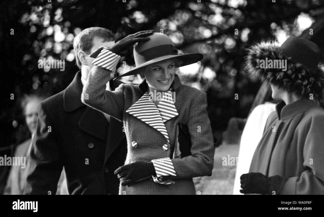 Princess Diana holds on to her hat in the wind. Stock Photo