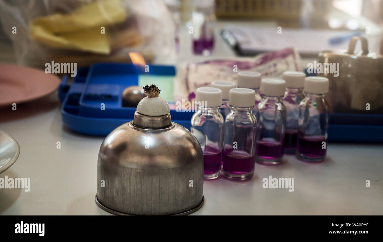 Alcohol burner and test tube in rack,science laboratory research and