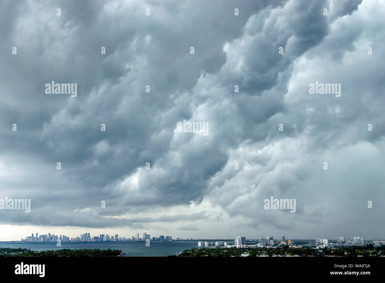 Miami Beach Florida,city skyline,clouds weather sky,storm clouds gathering,rain rainclouds,FL190731027 Stock Photo