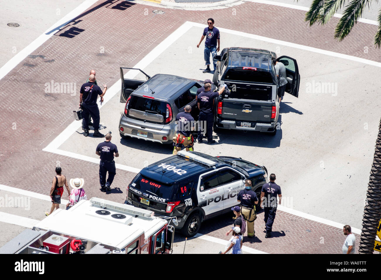 Miami Beach Florida,North Beach,Collins Avenue,traffic vehicle car automobile accident fender bender,collision,police policeman,fire rescue,FL19073103 Stock Photo