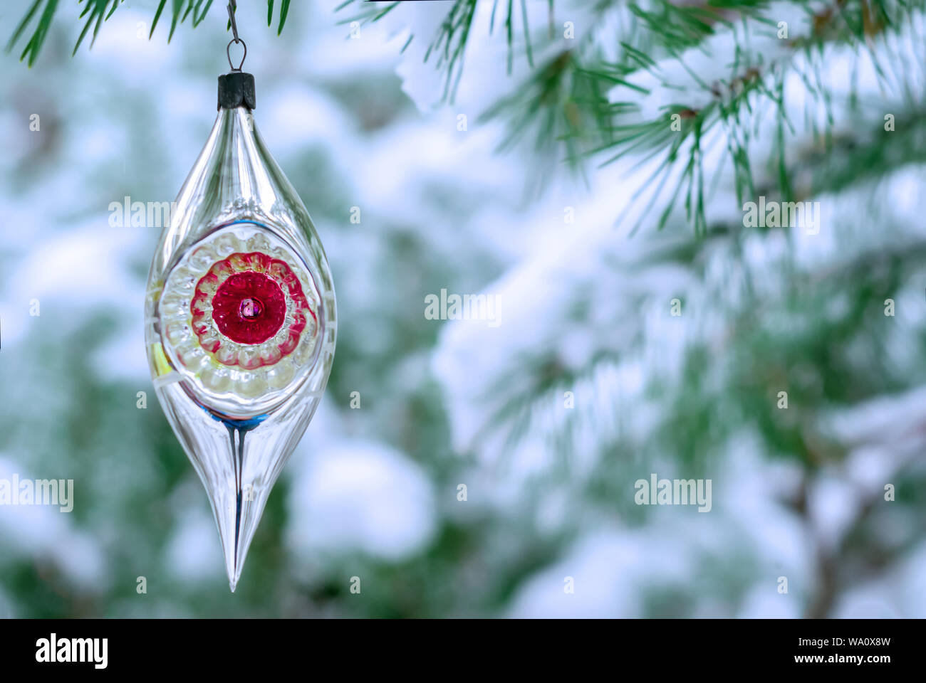 Vintage Christmas Decoration On A Lively Fir In Snowy Winter
