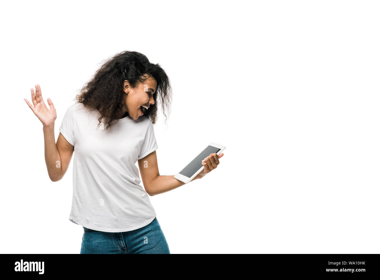 happy african american girl looking at digital tablet and gesturing ...