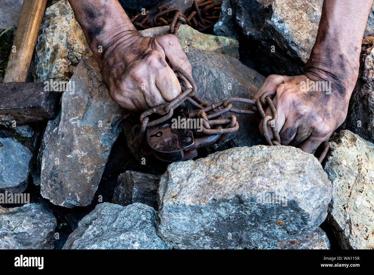 The hands of a slave in an attempt to release. The symbol of slave
