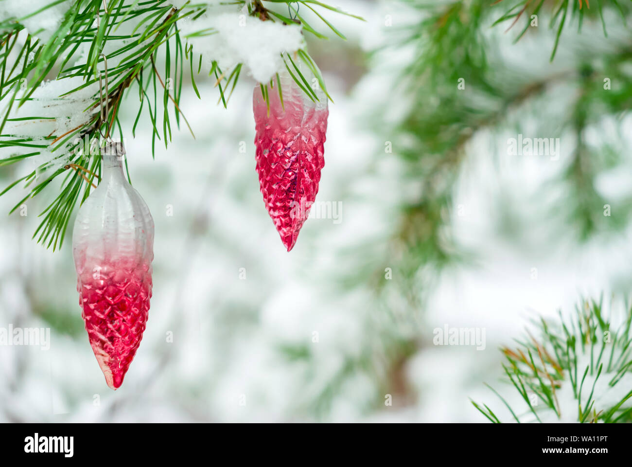Vintage Christmas Decorations On A Lively Fir In Snowy Winter