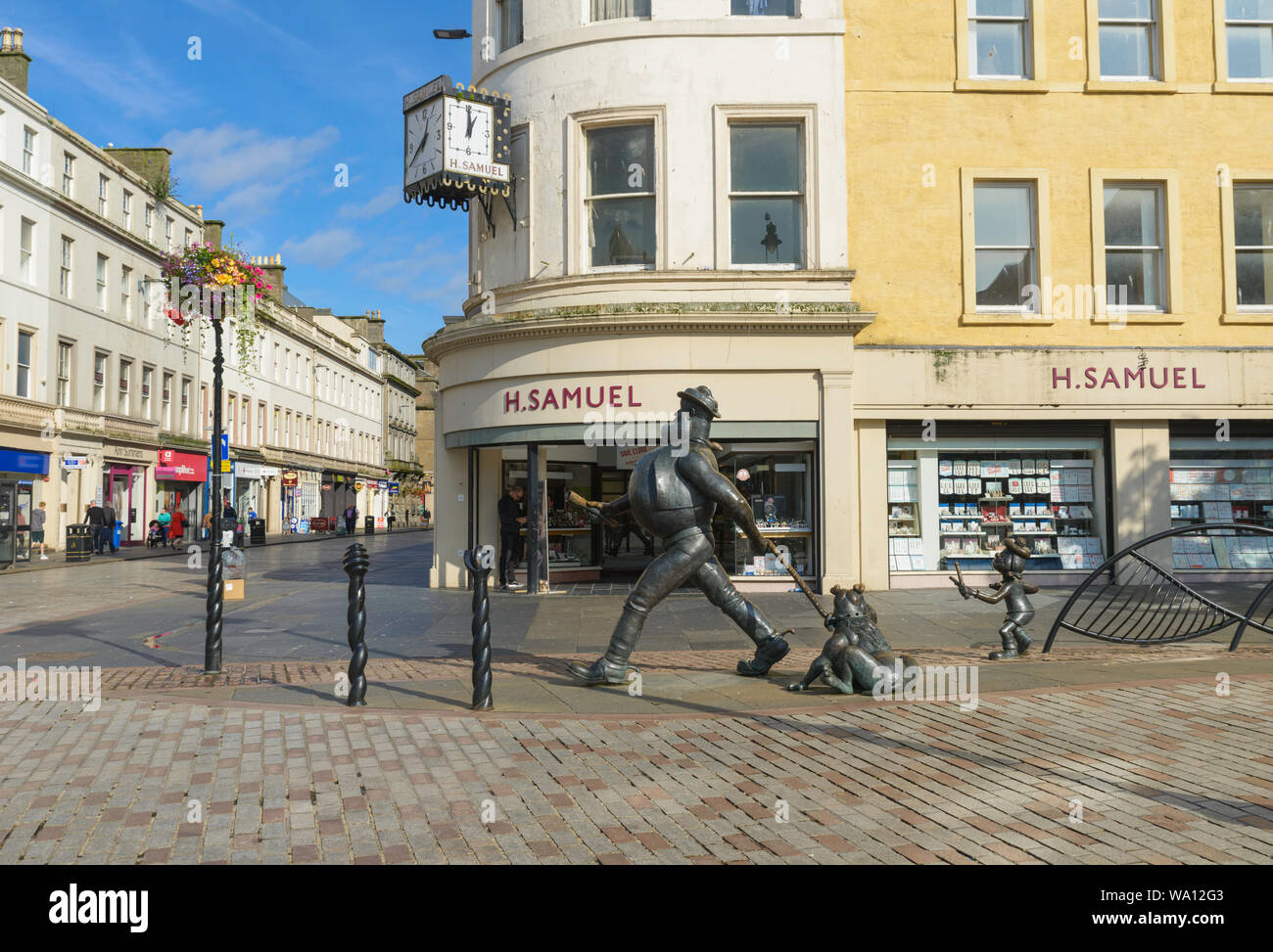 Statues of famous DC Thomson children's cartoon comic characters Desperate Dan and Mini the Minx