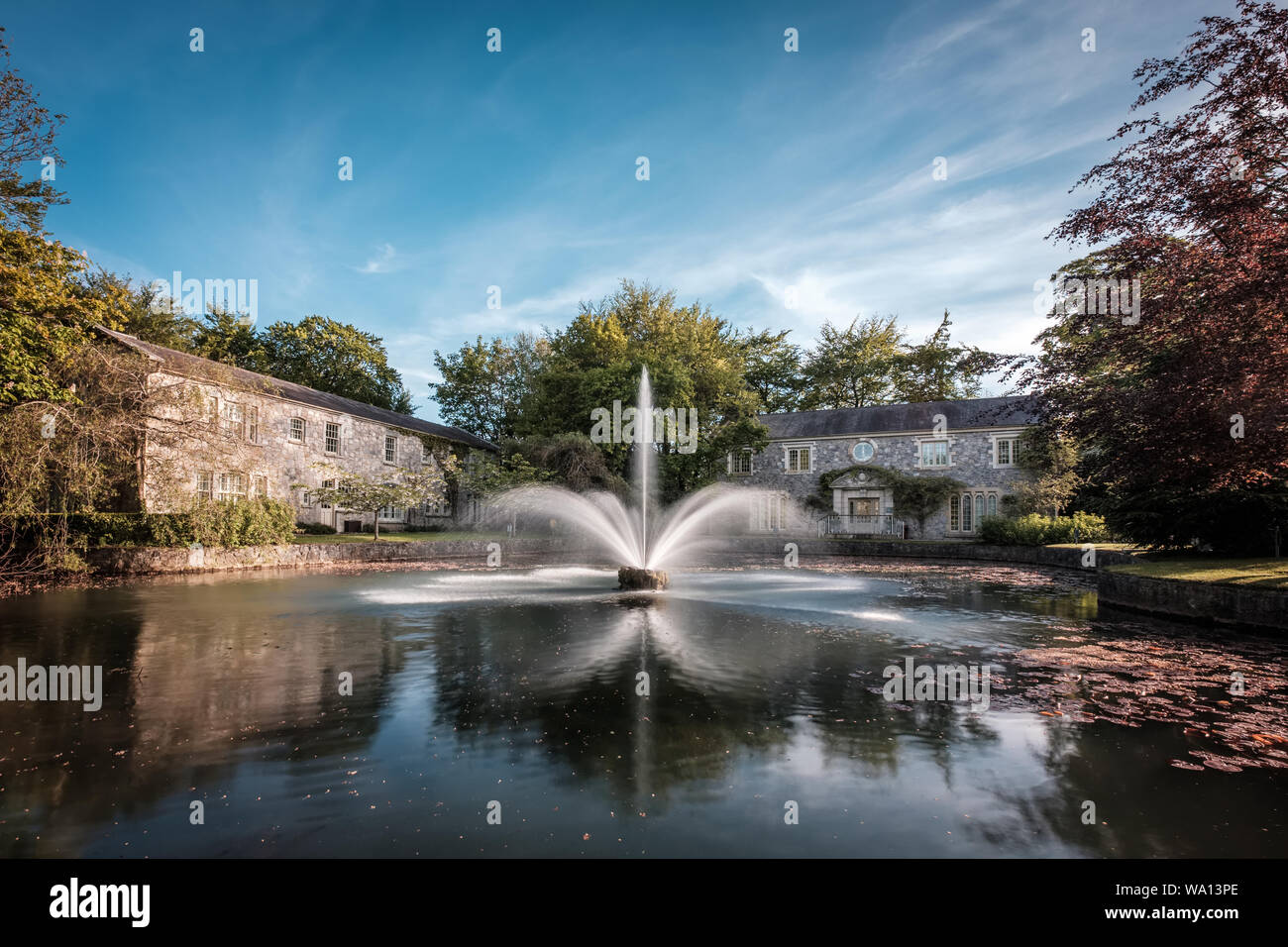 Cliff at Lyons, Celbridge, Kildare, Ireland - 13th May 2019. A water fountain forms a dramatic centrepiece to the lake at Cliff at Lyons hotel in Kild Stock Photo