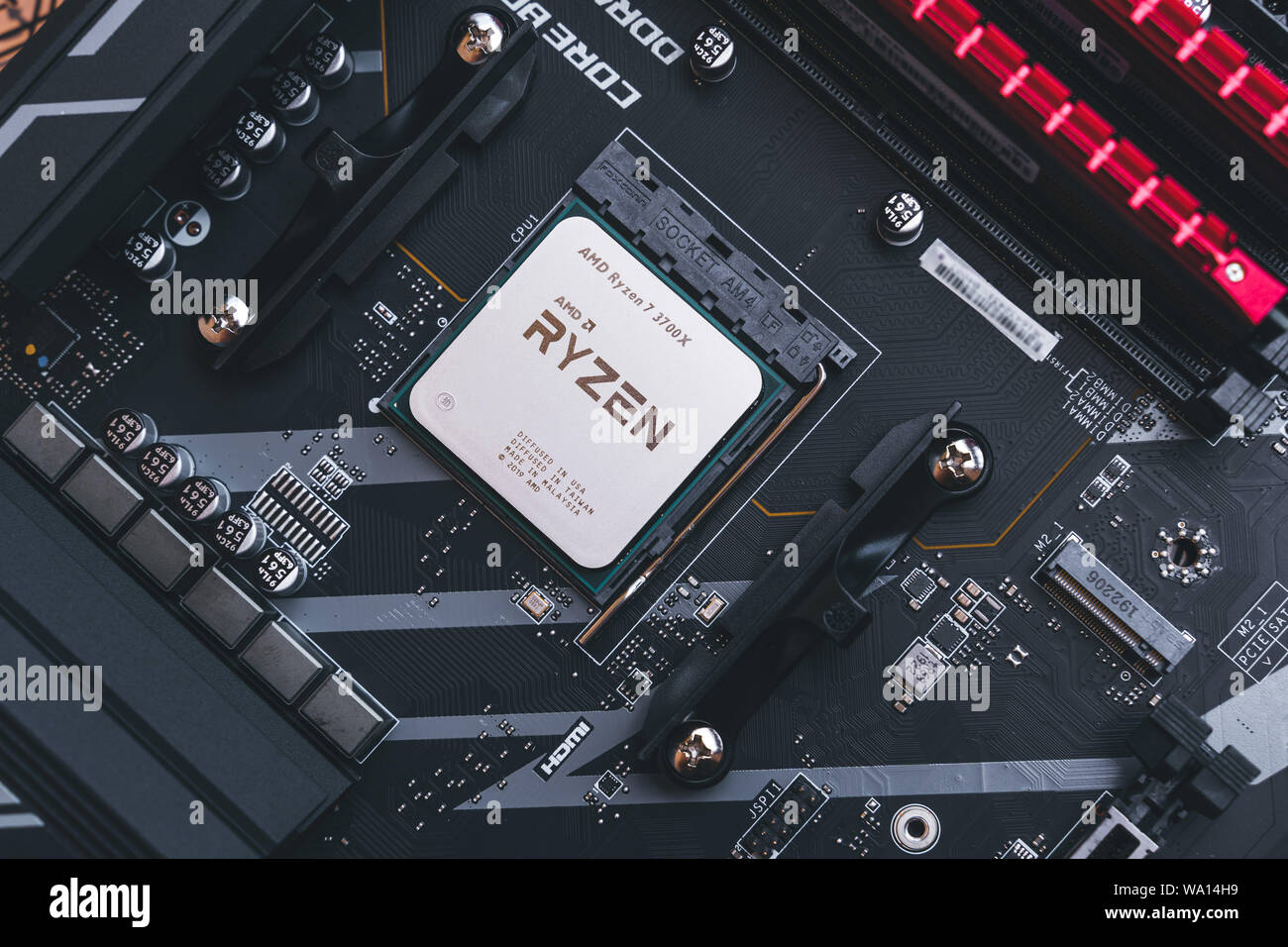 AMD Ryzen 3700x processor in the X570 motherboard socket. New Zen 2, 7  nanometer desktop CPU by AMD. Very popular 3rd generation Ryzen 3000  processor Stock Photo - Alamy