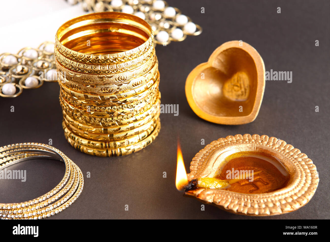 Oil lamp near jewelry Stock Photo Alamy