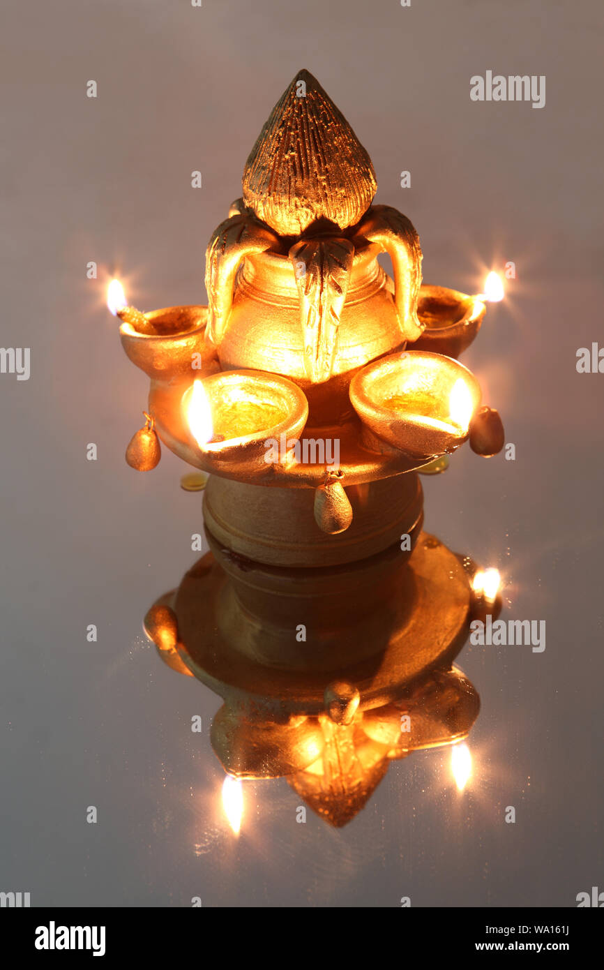 Burning oil lamp Stock Photo Alamy