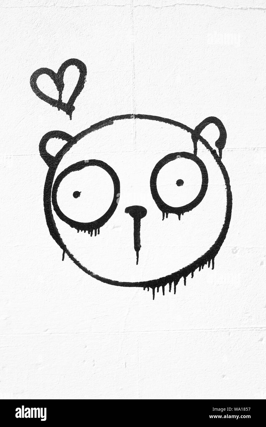 Street art in Fulham, London featuring bear and heart. Stock Photo
