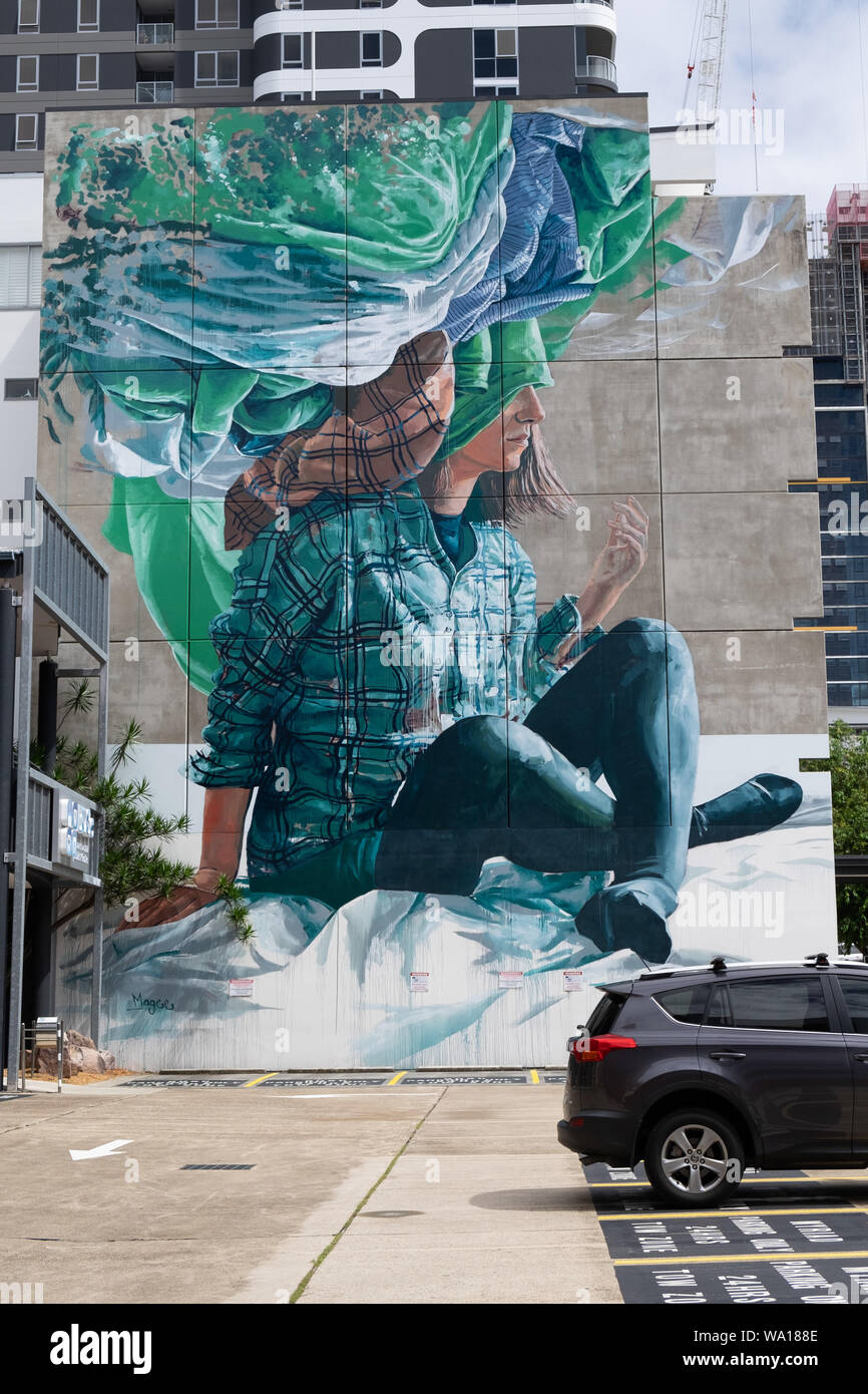 Head in the clouds a large scale mural by Australian artist Fintan Magee, Brisbane, Australia Stock Photo