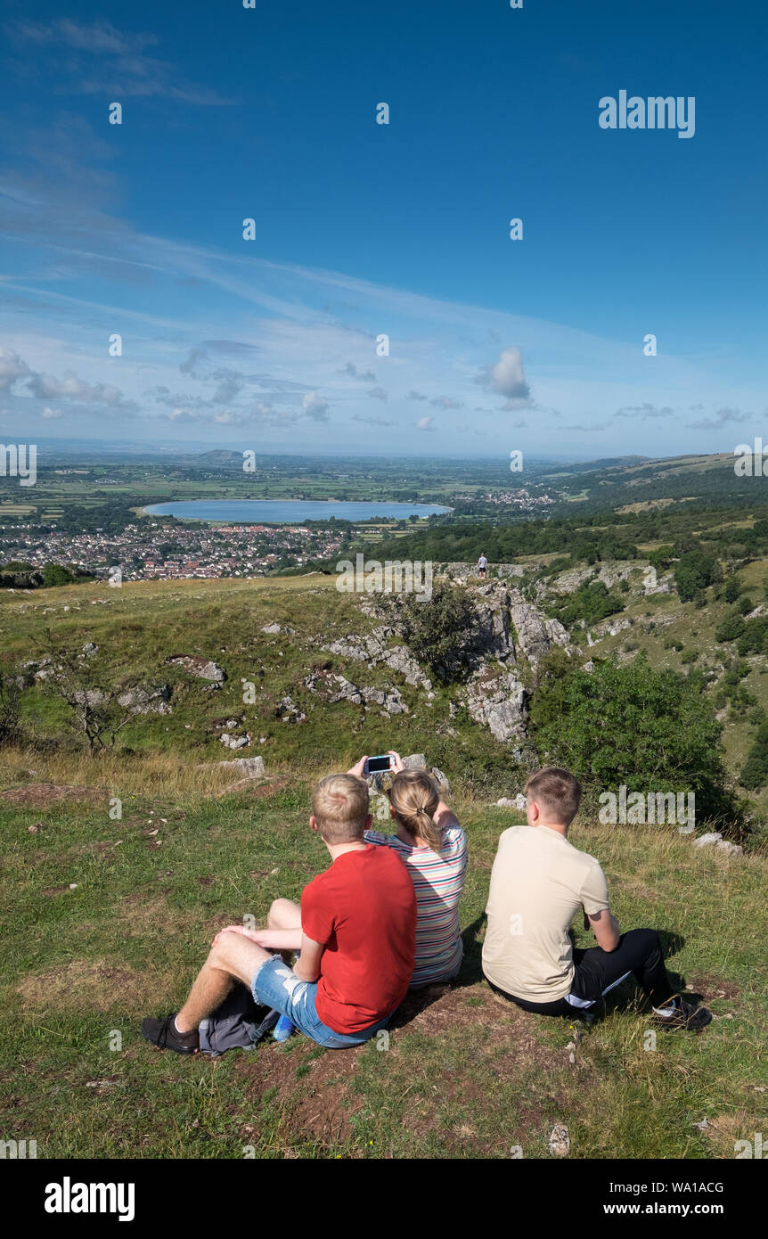 A Family take in the views from the top of Cheddar Gorge in Somerset, UK Stock Photo