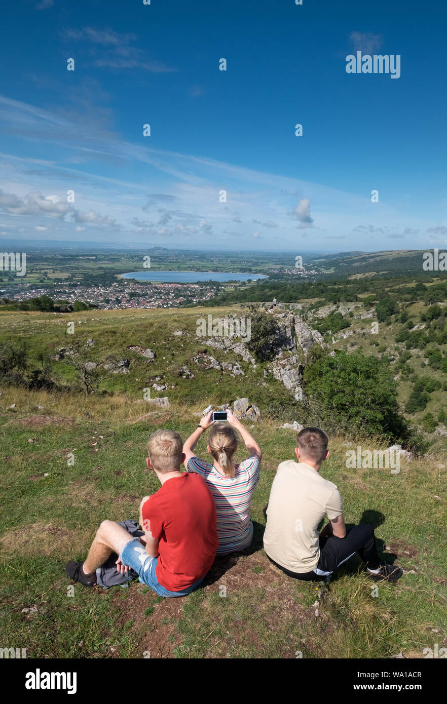 A Family take in the views from the top of Cheddar Gorge in Somerset, UK Stock Photo