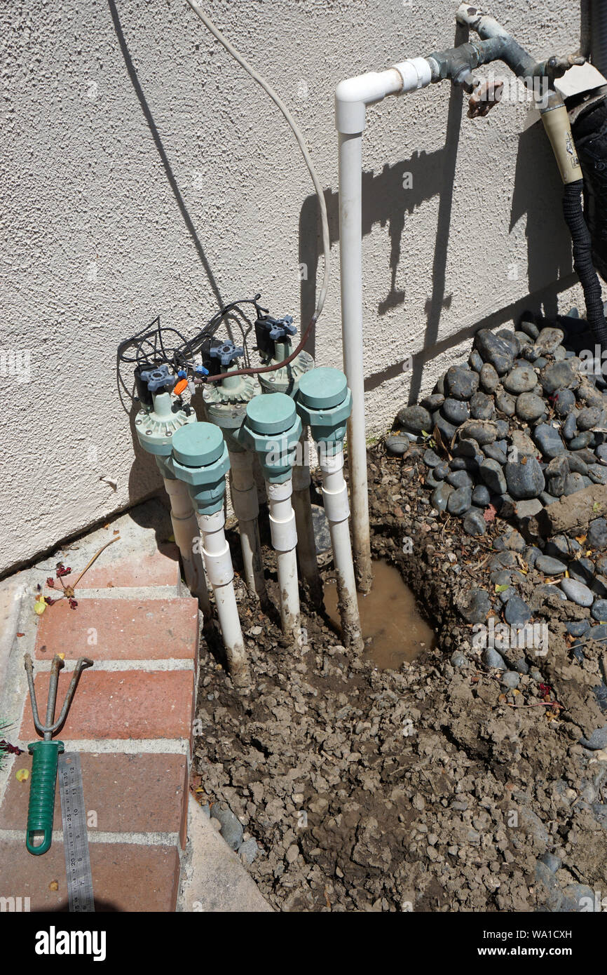 Control valves for lawn irrigation system Stock Photo Alamy