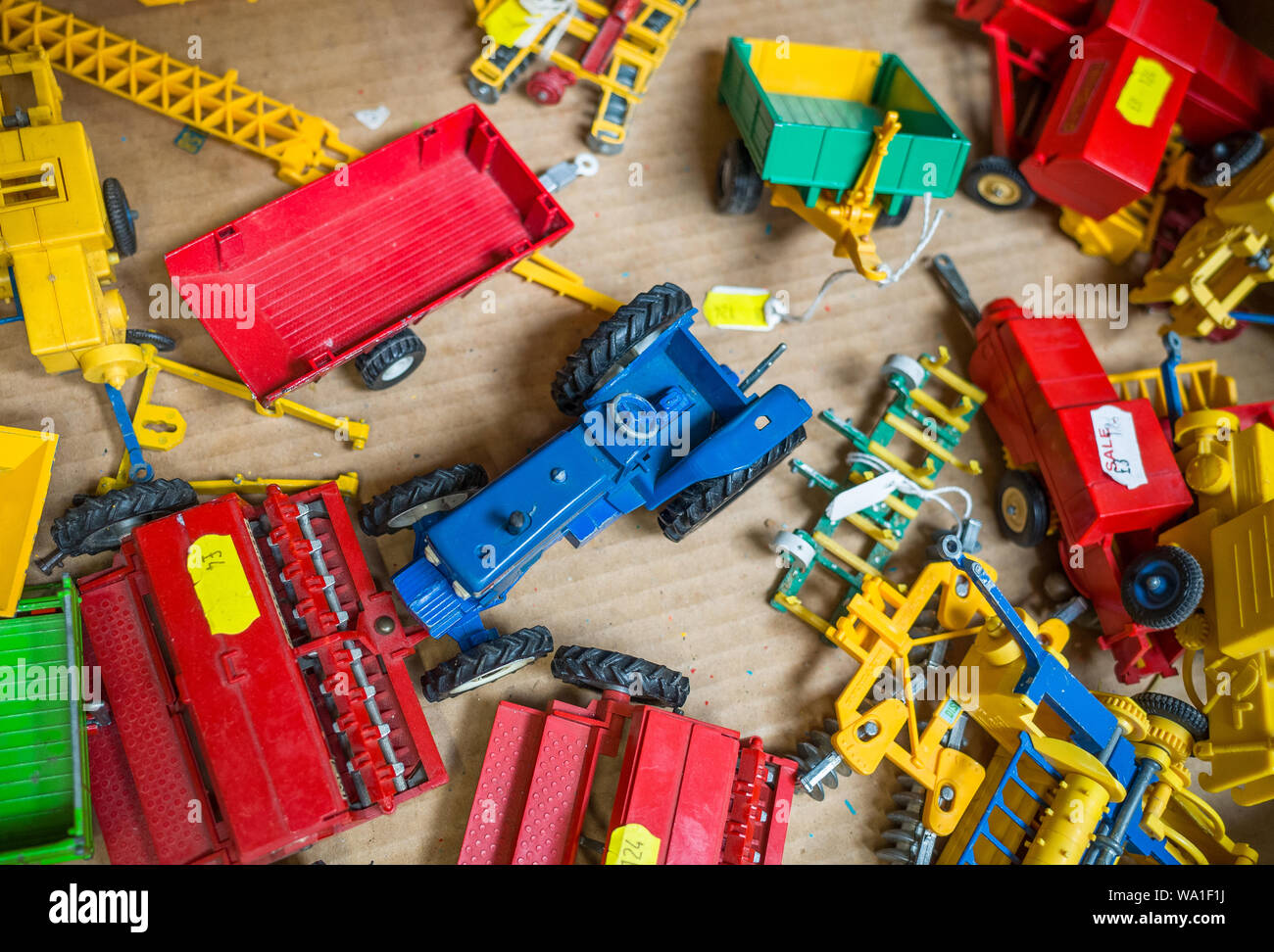 Old diecast farm vehicles for sale in a box Stock Photo Alamy