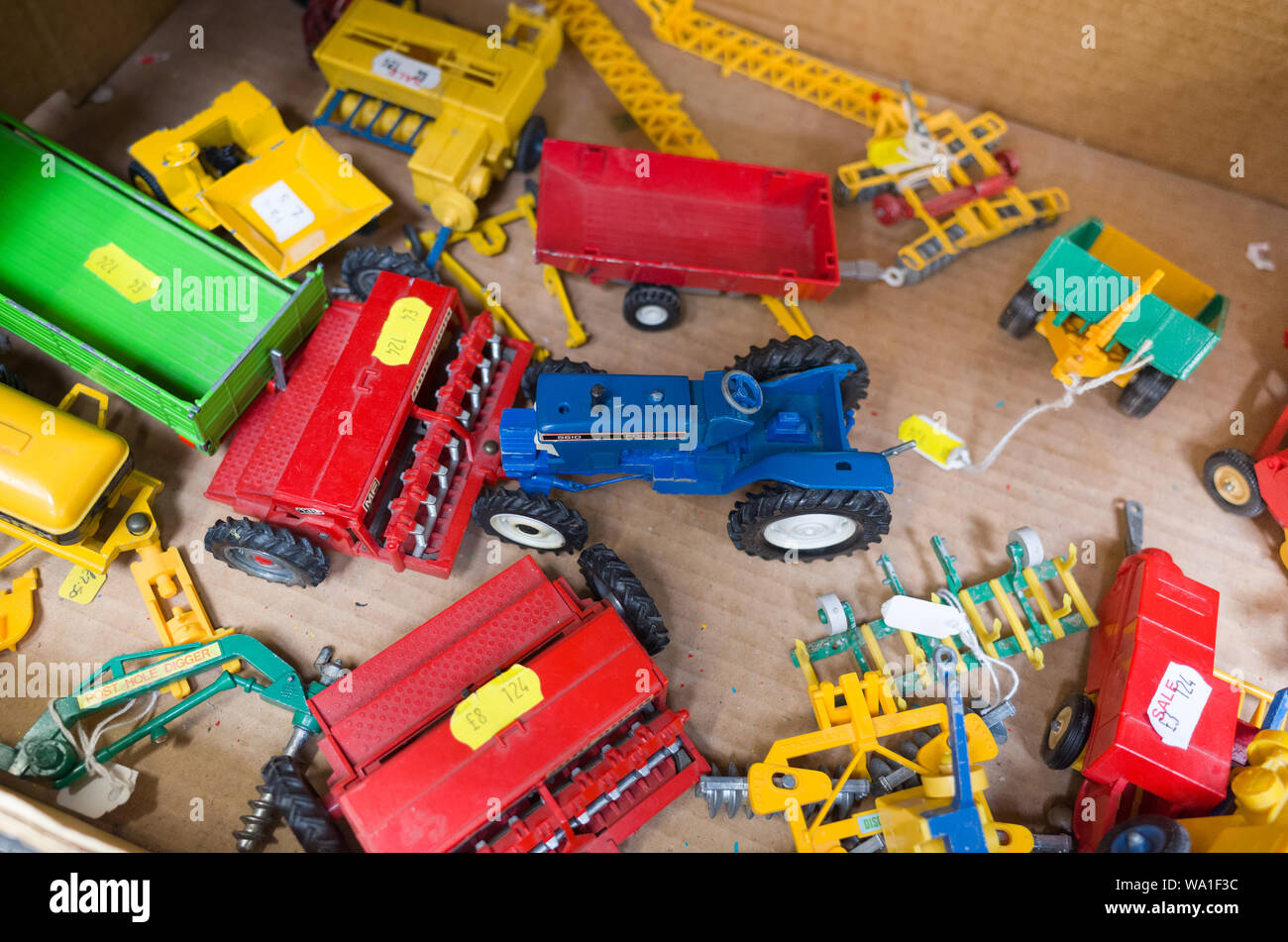 Old diecast farm vehicles for sale in a box Stock Photo Alamy