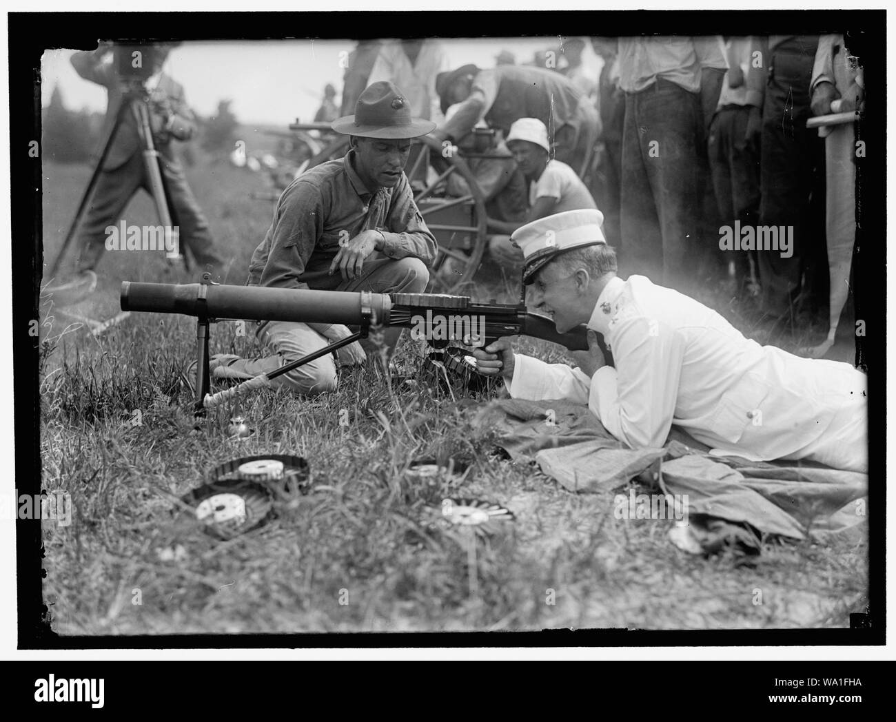 BARNETT, GEORGE, MAJ. GEN., COMMANDANT, U.S.M.C. MARINE CORPS RIFLE RANGE; INSPECTING COLT'S AUTOMATIC Stock Photo