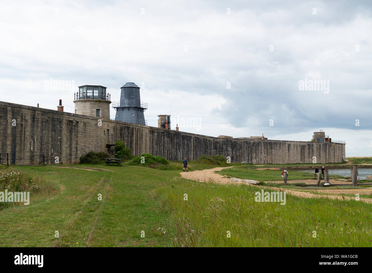 Hurst Castle from the South Eastern end showing it’s two former lighthouses. Stock Photo