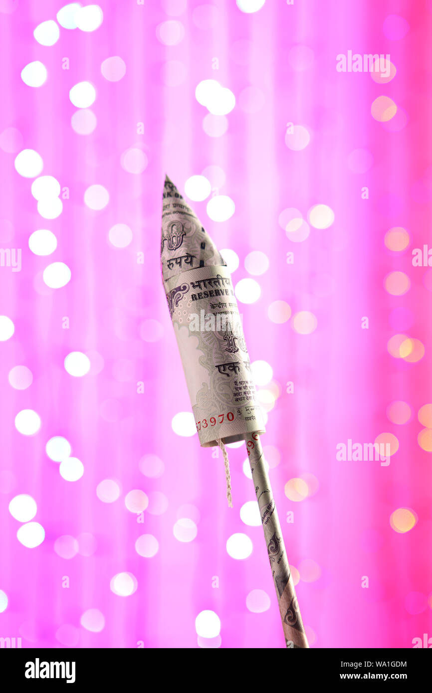 Diwali rocket made up of Indian banknotes Stock Photo