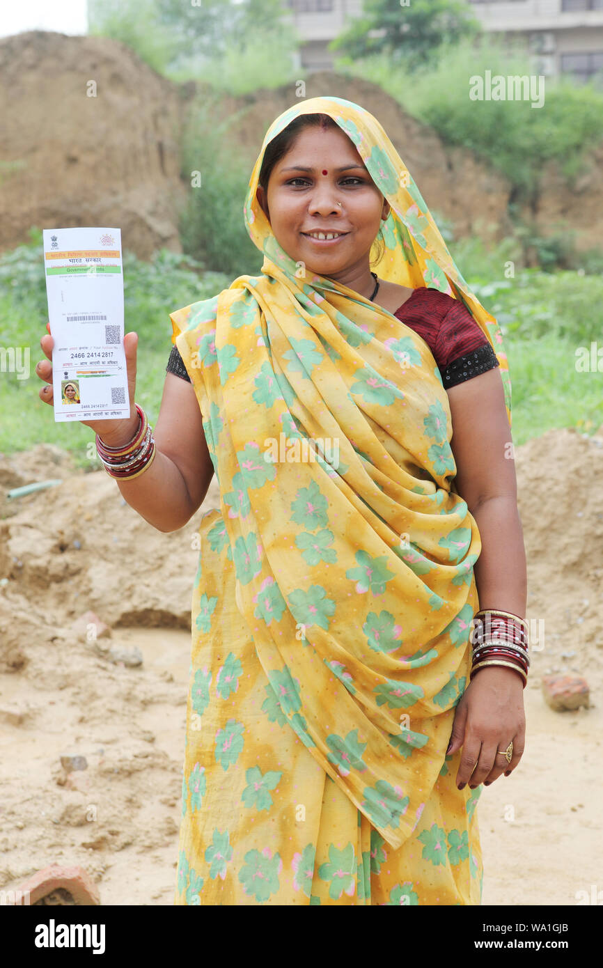 Rural woman showing an Aadhar card Stock Photo Alamy