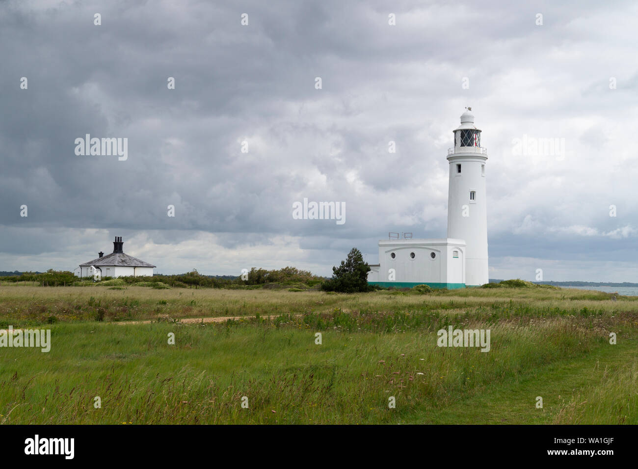 Hurst Point Lighthouse and Cottage. Stock Photo