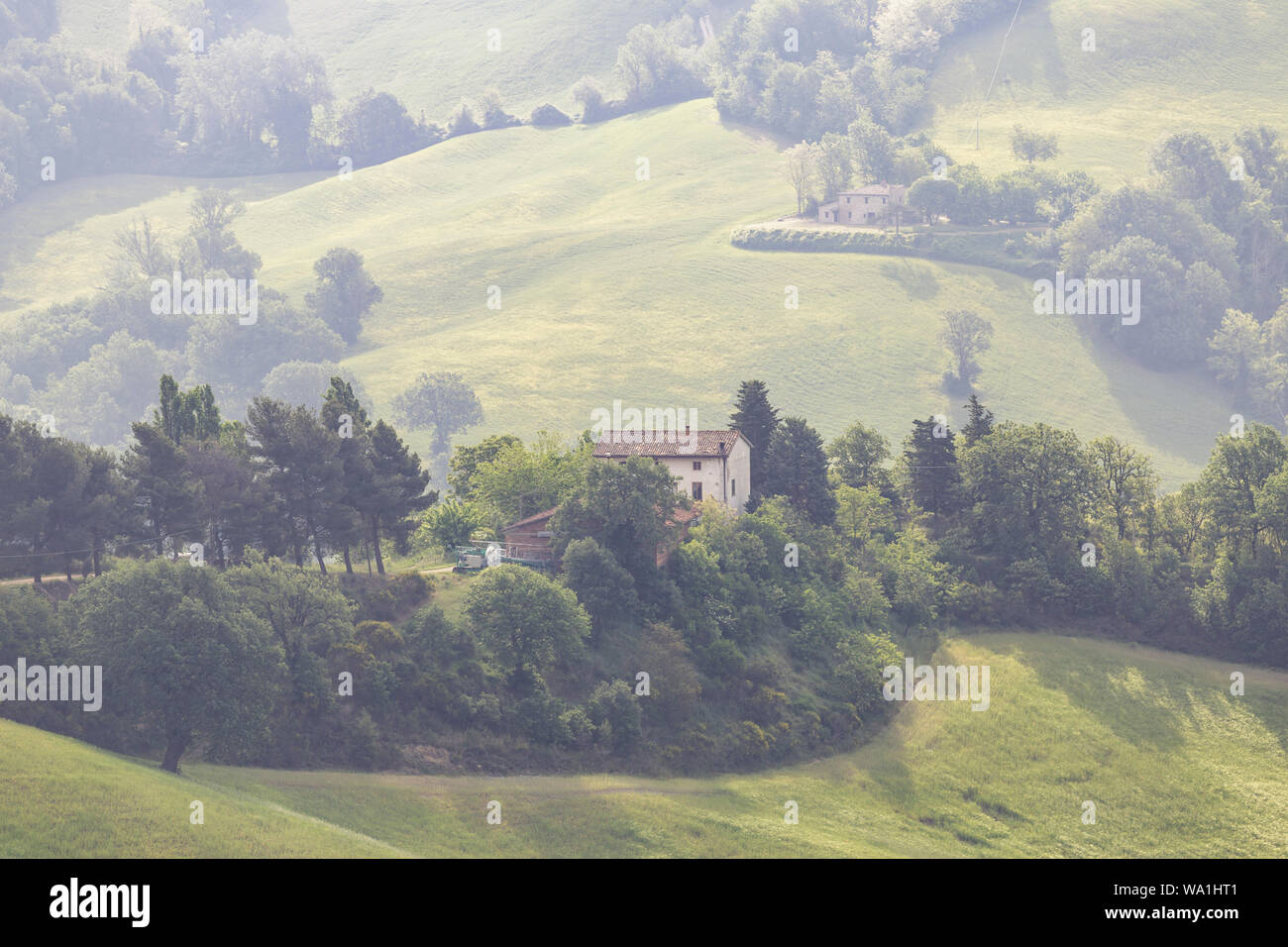 The rolling landscape of Le Marche near to Urbino in Italy. Stock Photo