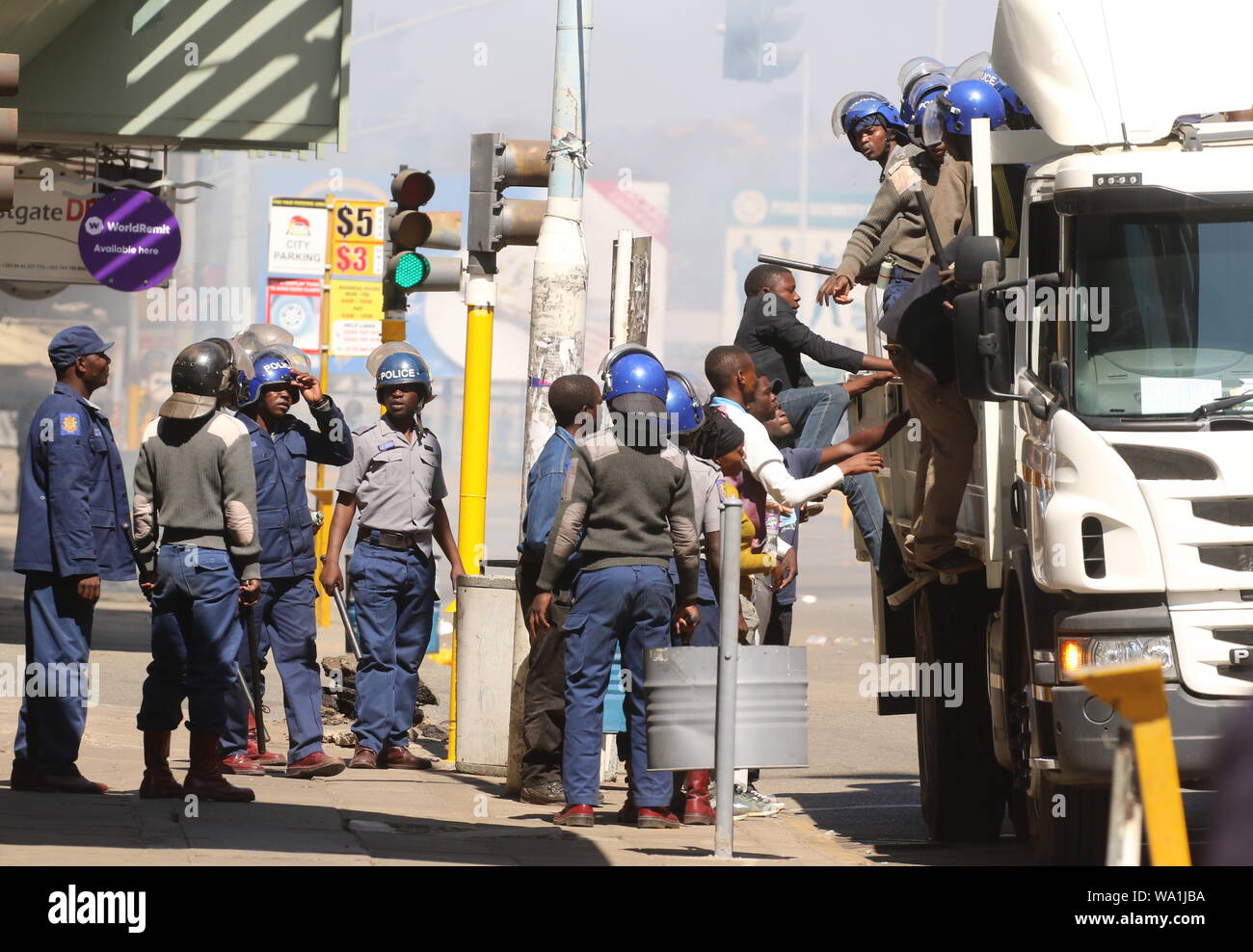 Harare, Zimbabwe. 16th Aug, 2019. Police officers are seen in Harare