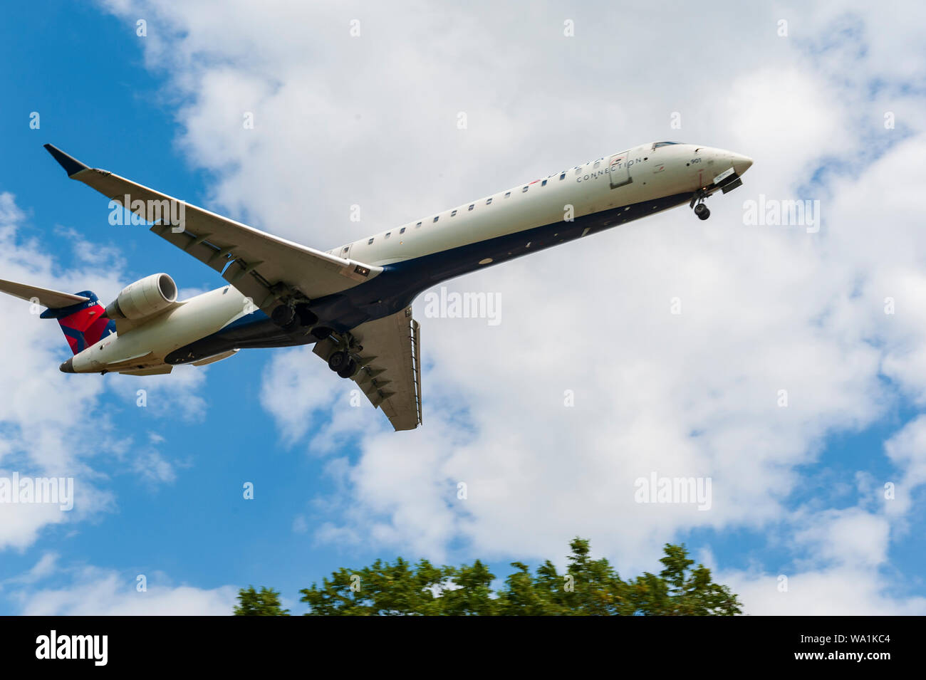 Delta Connection taking off from Lexington Bluegrass Airport in Lexington Kentucky Stock Photo