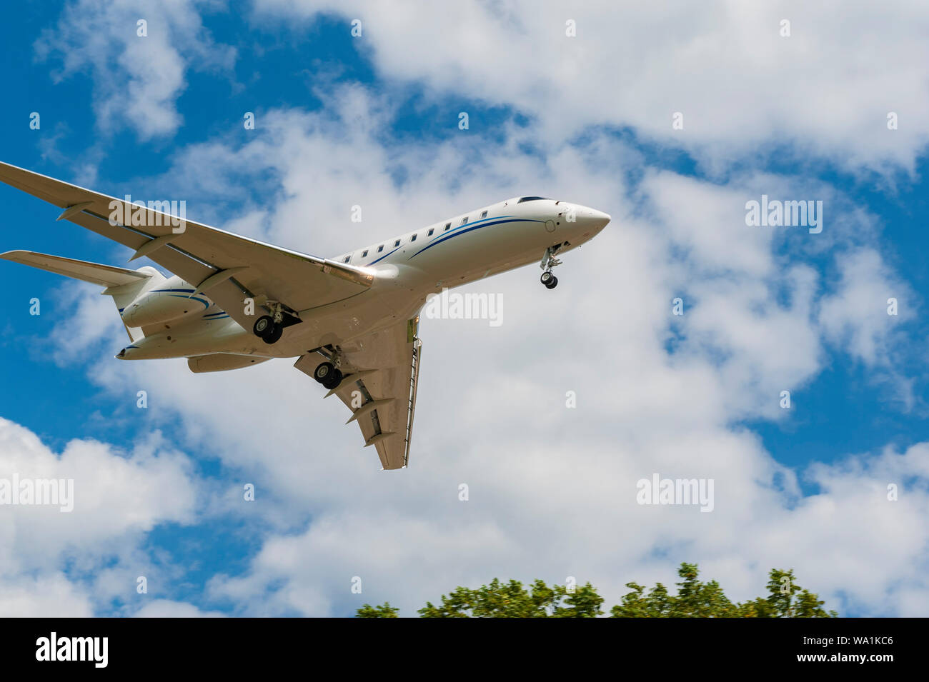 BOMBARDIER BD-700-1A11 Corporate Jet landing at Lexington Bluegrass Airport Stock Photo