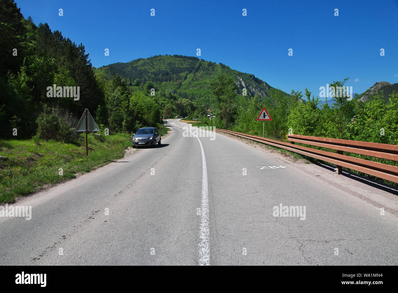 Sarajevo / Bosina and Herzegovina - 27 Apr 2018: The road on green mountains of Bosnia and Herzegovina Stock Photo