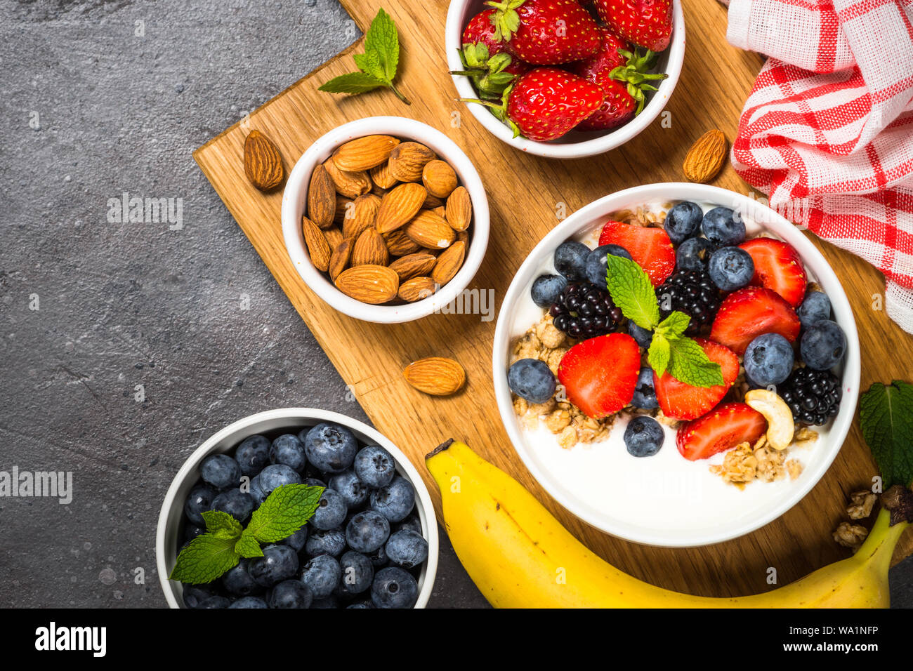 Greek yogurt granola with fresh berries Stock Photo - Alamy