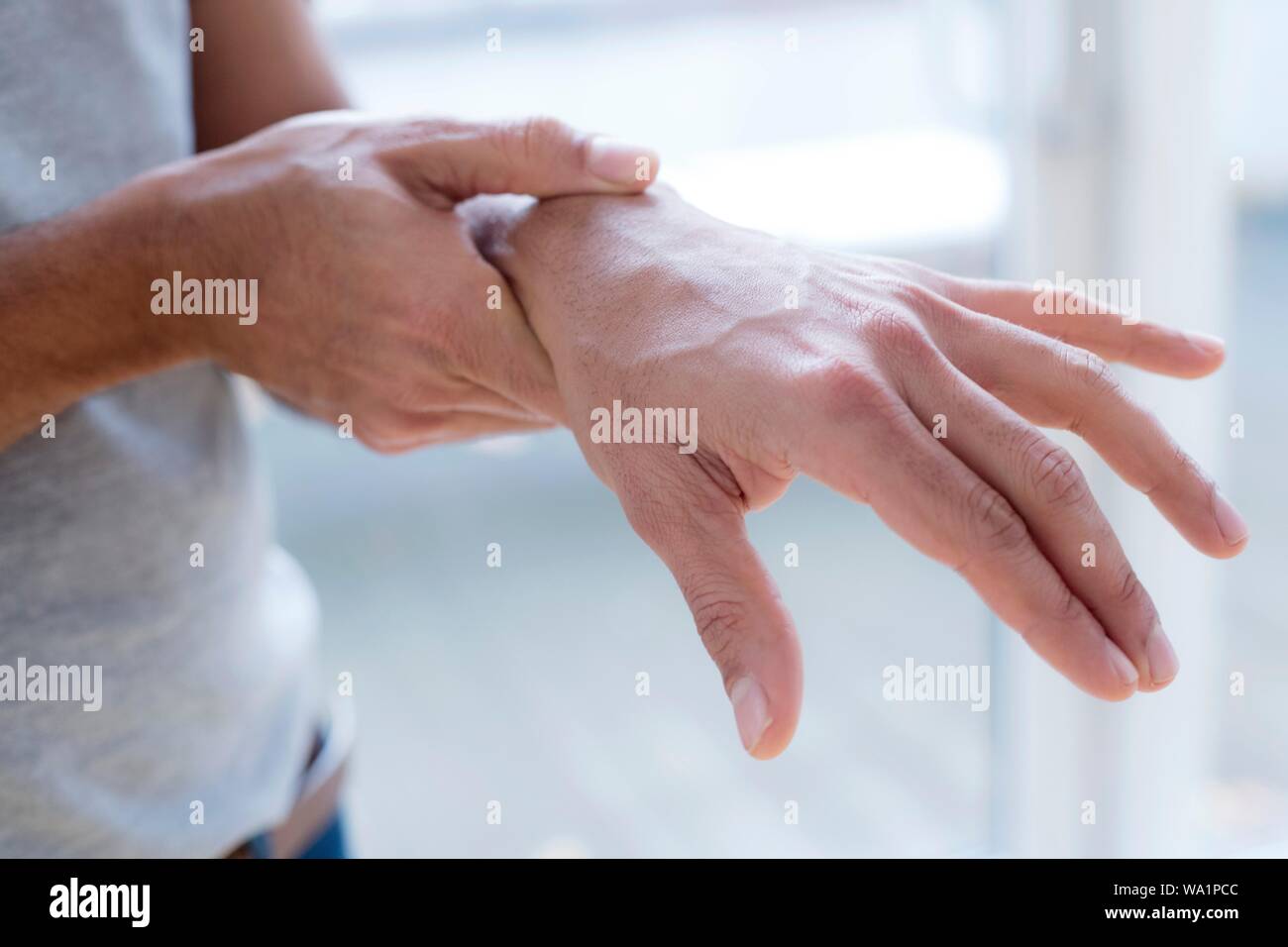 Hand pain man hires stock photography and images Alamy