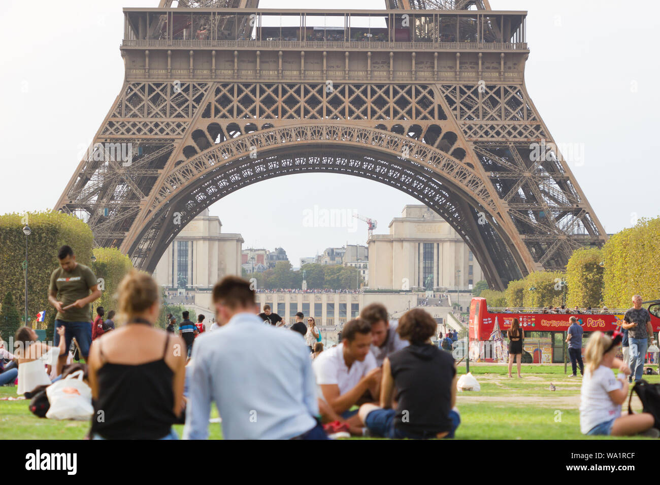 PARIS, FRANCE - 05 Settembre 2018: Tourists visited Eiffel tower (Eiffel tour) in sunny summer day. Eiffel tower is most popular travel and romantic d Stock Photo