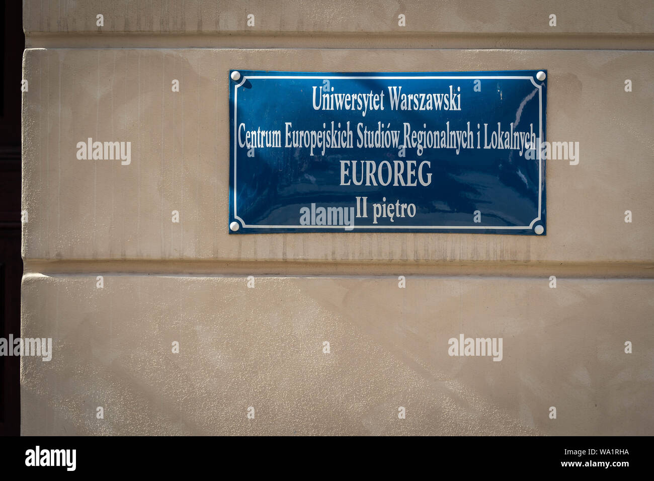 Warsaw, Poland - August 2019: Sign at the Centre for European Regional and Local Studies (EUROREG) in Warsaw. 'II pietro' means 'second floor' in poli Stock Photo