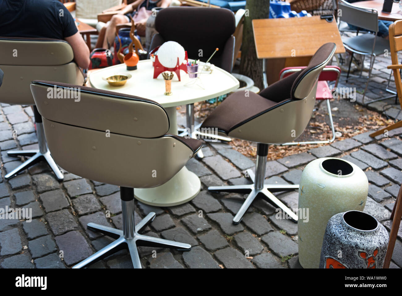 Mid-century modern dining set at the Arkonaplatz flea market, Berlin, Germany. Stock Photo