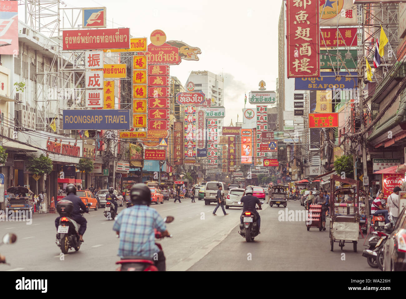 Bangkok, Thailand: the main street of Chinatown, Yaowarat Road in the evening, with its large signboards written in Chinese. Stock Photo