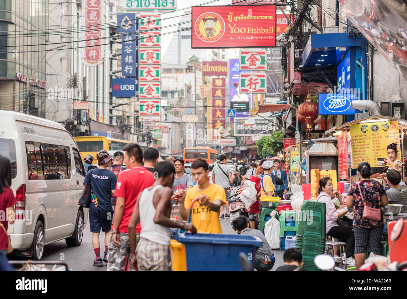 Bangkok, Thailand - June 5, 2019: a diverse crowd in Yaowarat Road, the main street of Chinatown, known as one of the top destinations of the city. Stock Photo