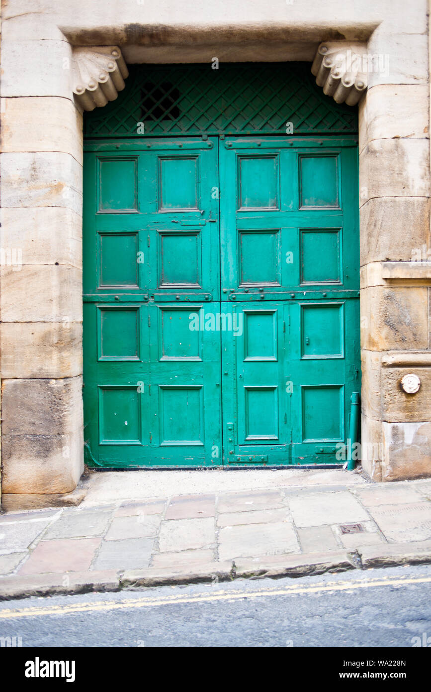 Green Doors and decorative archway, Bradford, England Stock Photo Alamy