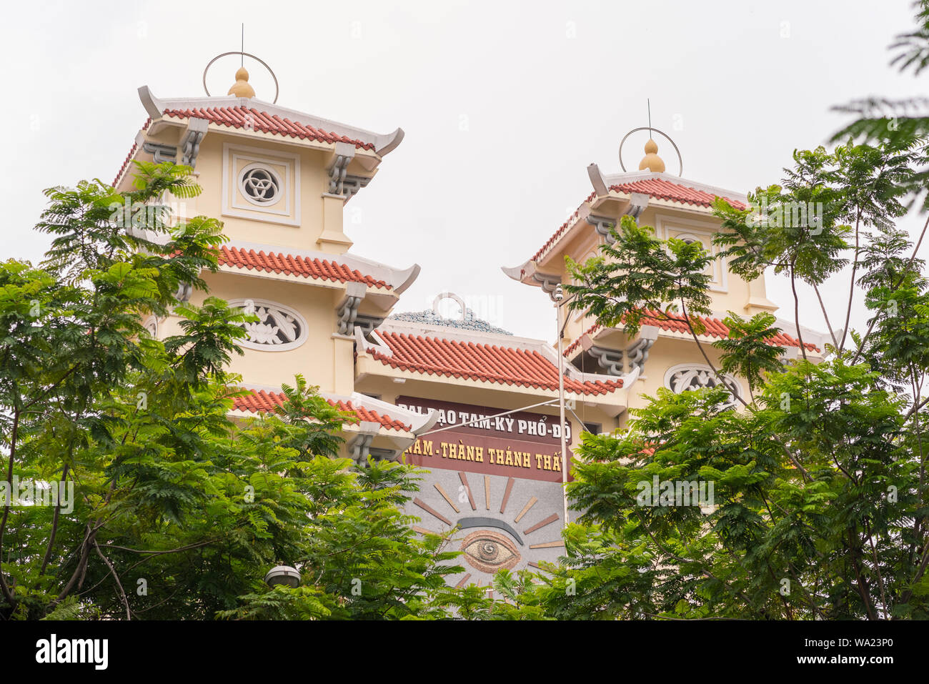 Ho Chi Minh City, Vietnam - April 28, 2019: the facade of Cao Dai temple Thanh That Nam Thanh (Thanh That Cau Kho) in Nguyen Cu Trinh Street Stock Photo