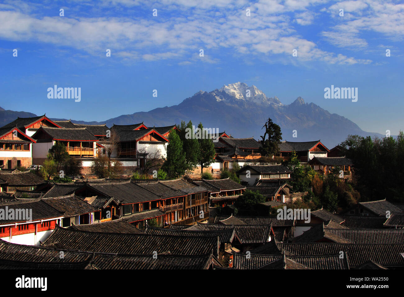 Jade dragon snow mountain Stock Photo - Alamy